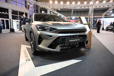 Sporty front view with aggressive bumper and LED headlights