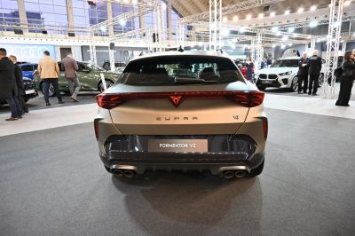 Rear view with quad exhausts, LED taillights, and sporty trim