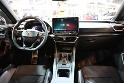 Interior with digital dashboard, multifunction steering wheel, and central touchscreen