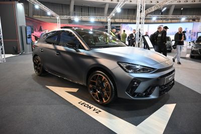 Sporty hatchback with sharp LED headlights and bronze alloy wheels