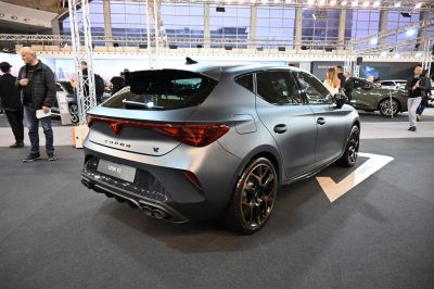 Sporty hatchback rear and side with quad exhaust and alloy wheels