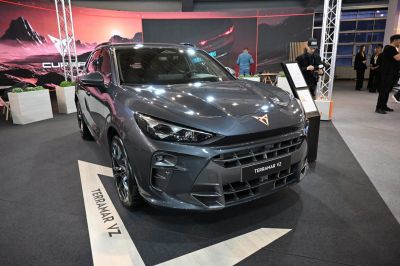 Sporty front fascia with sleek headlights and aggressive grille design