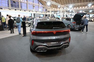 Rear view of modern SUV with sporty taillights and dual exhaust