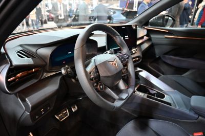 Steering wheel and digital dashboard in modern car interior
