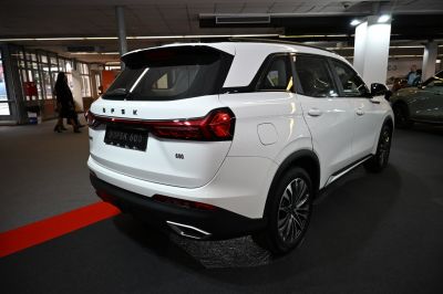Rear view of SUV with LED tail lights and dual exhaust