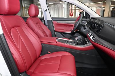 Red leather seats with modern dashboard and center console