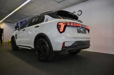 LED tail lights and black alloy rims on a rear SUV view