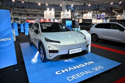 Electric crossover with sleek LED daytime running lights and sporty wheels