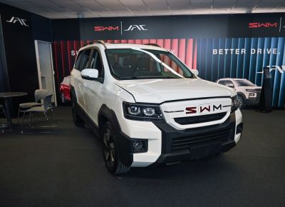 Front view of SUV with bold grille and LED headlights