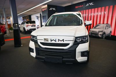 Front fascia with bold grille and modern headlights