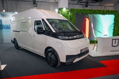 Futuristic front view and high roof silhouette of an electric van