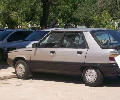 Angular hatchback side profile with classic wheel covers