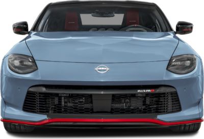 Front view with grille, blacked-out headlights, and red lower bumper accent