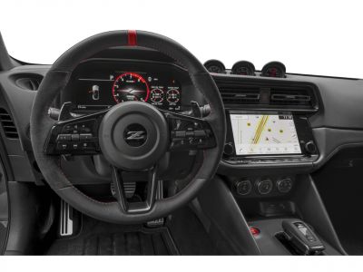Digital instrument cluster, sporty steering wheel, and infotainment display