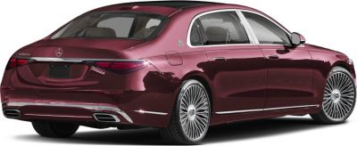 Rear view of luxury sedan with Maybach emblem and multi-spoke alloy wheels