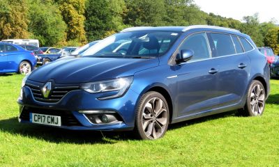 Blue modern station wagon front and side view with alloy wheels