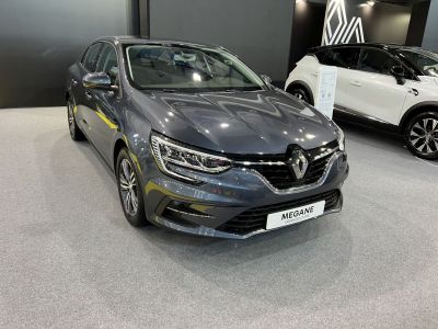 Front view of a sleek grey sedan with LED headlights and modern grille