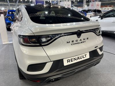 Modern rear design with sleek taillights and prominent branding