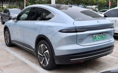 Rear-side view of electric SUV with sleek tail light and aerodynamic design