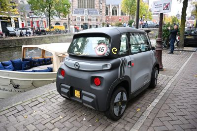 Compact electric microcar rear view with distinctive taillights