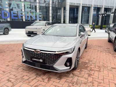Front view with LED headlights and large grille