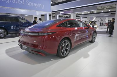 Sporty sedan rear with alloy wheels and integrated taillights