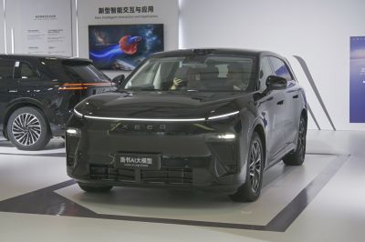 Front view showcasing LED light bar and modern grille design