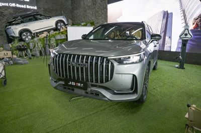 Bold front grille with vertical bars and sleek LED headlights