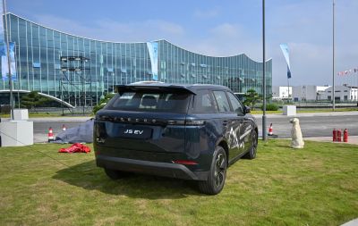 2026 SUV rear view with sleek taillights and roof spoiler