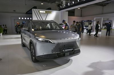 Modern front end with slim LED headlights and hexagonal pattern grille