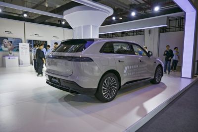 Rear and side view of a sleek modern SUV with LED tail lights and aerodynamic design