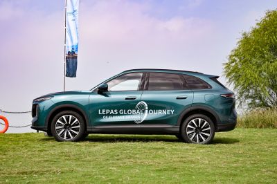 Side view of 2026 SUV with distinctive alloy wheels and sleek profile