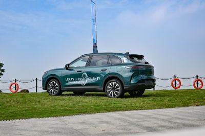 Rear side view of a sleek electric SUV with modern alloy wheels