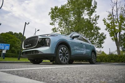 Futuristic SUV with prominent front grille and modern alloy wheels.