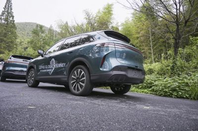 Rear and side view of an electric SUV with taillights and alloy wheels