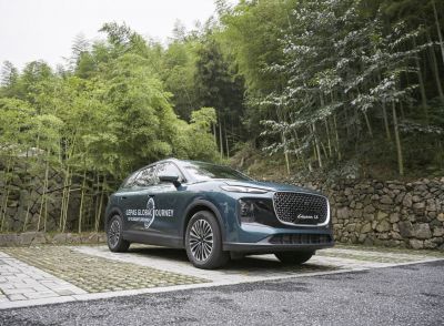 Futuristic SUV with large distinctive front grille and aerodynamic shape