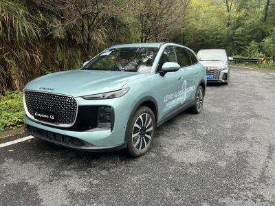 Large front grille and sleek headlights on SUV