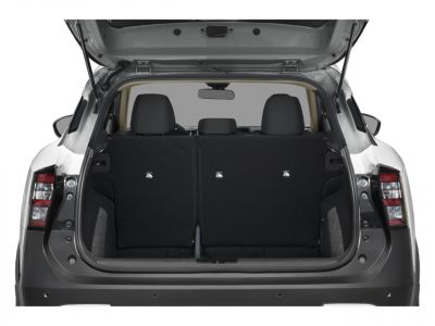 Open rear trunk with upright seats and spacious cargo area.