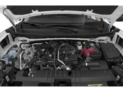 Open engine compartment with detailed engine and components.