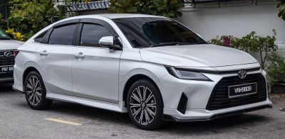 Modern sedan, LED headlights, alloy wheels, front side view