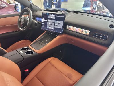 Modern car interior with large touchscreen and digital dashboard