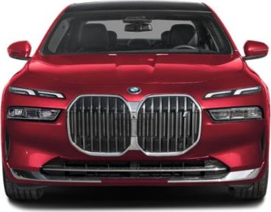 Front view with split headlights and large vertical kidney grille