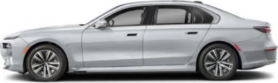 Silver luxury electric sedan side profile with alloy wheels