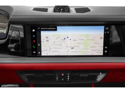 Wide infotainment display with digital map and dashboard controls