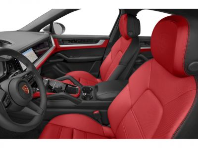 Red leather sport seats and digital dashboard in luxury car interior