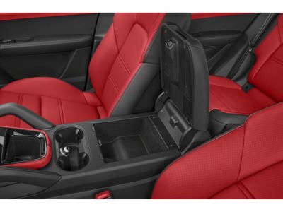 Premium red leather seats with open center console storage and cup holders