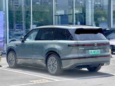 Rear and side view with alloy wheels of electric SUV