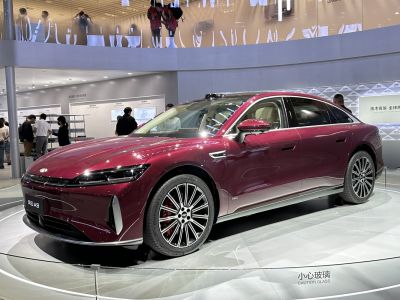 Sleek luxury sedan with LED headlights and multi-spoke alloy wheels