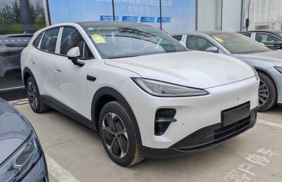 Sleek electric SUV with LED headlights and aerodynamic wheel design