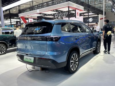 Rear view of SUV with LED tail lights and roof spoiler